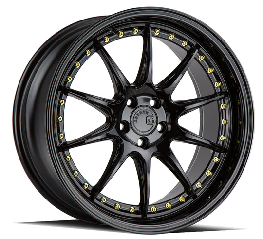 Aodhan DS07 wheel in Gloss Black w/ Gold Rivets - front face view