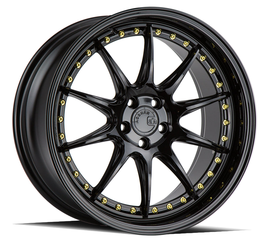 Aodhan DS07 wheel in Gloss Black w/ Gold Rivets - front face view